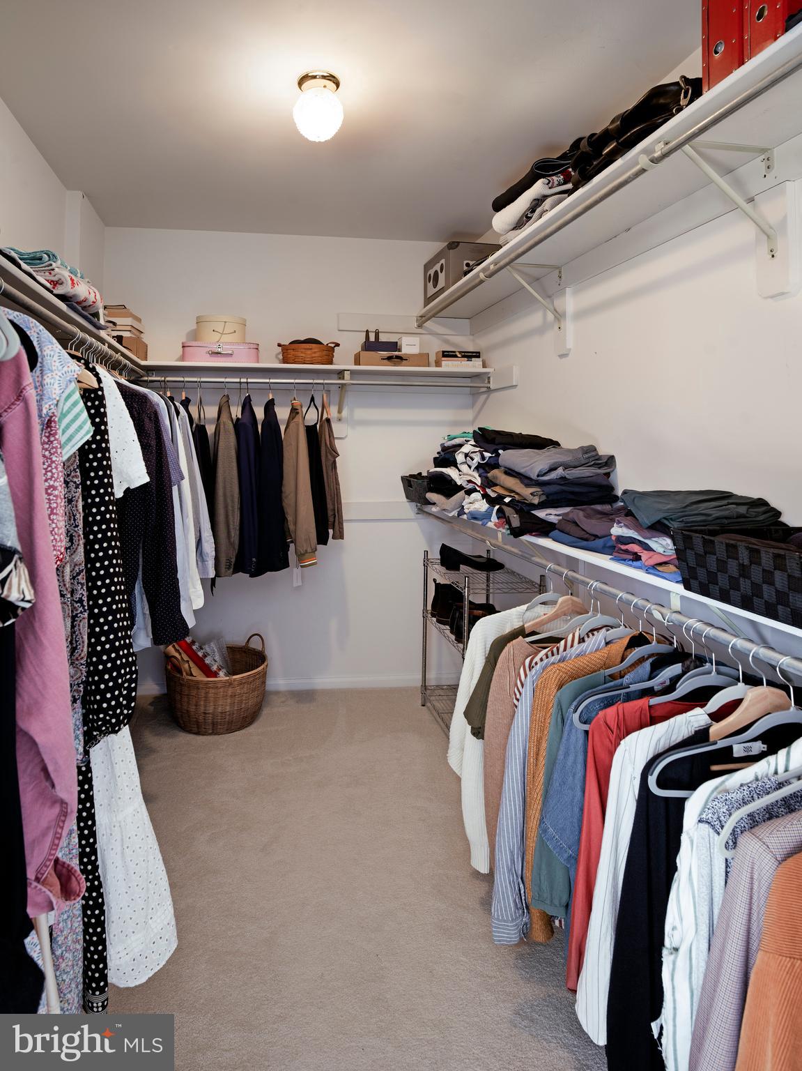 534 Pewter Drive Exton, PA 19341 - Photo 21 of 39 a view of walk in closet with clothes and shoes