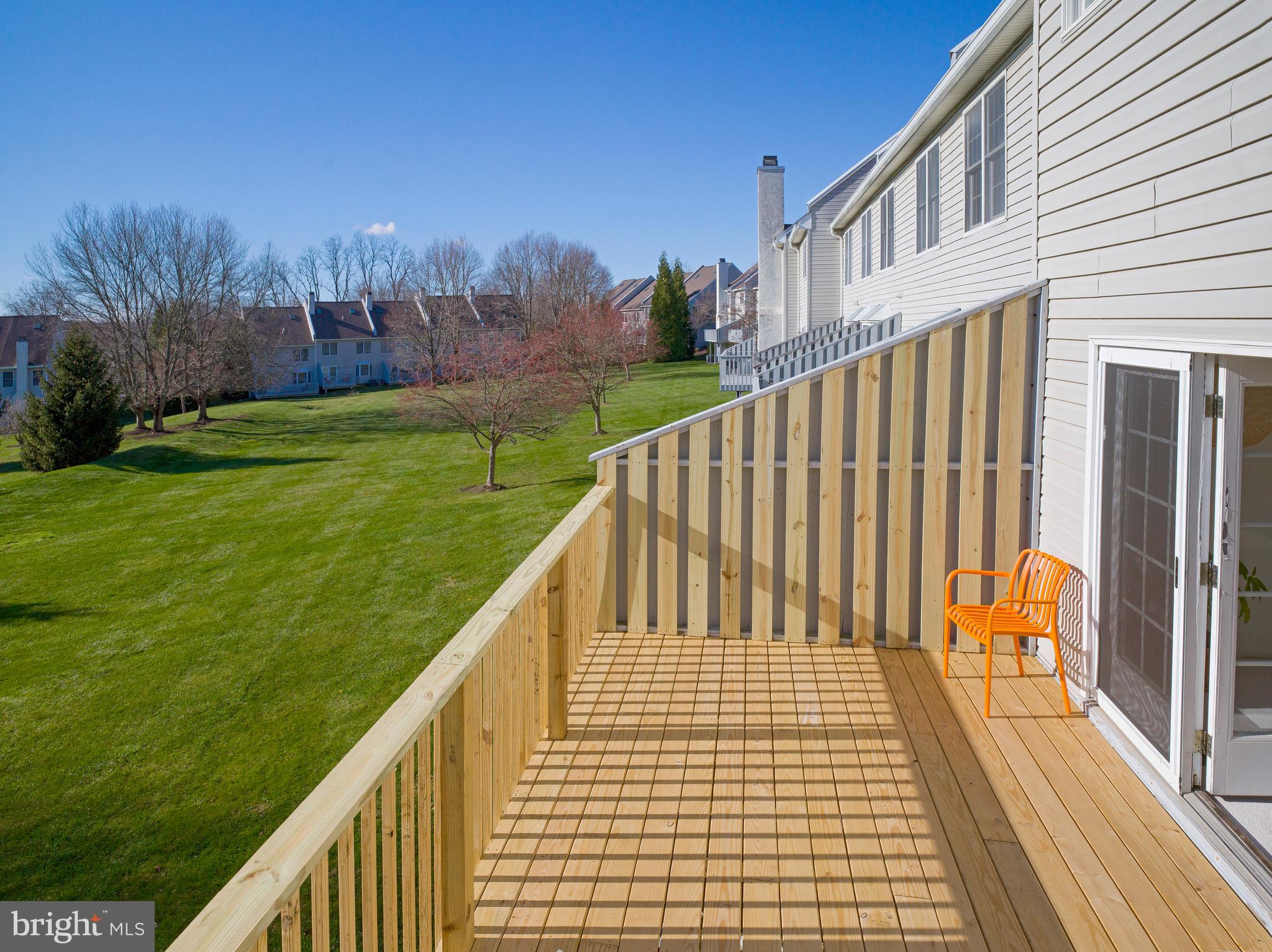 534 Pewter Drive Exton, PA 19341 - Photo 35 of 39 a view of a balcony with wooden floor and fence