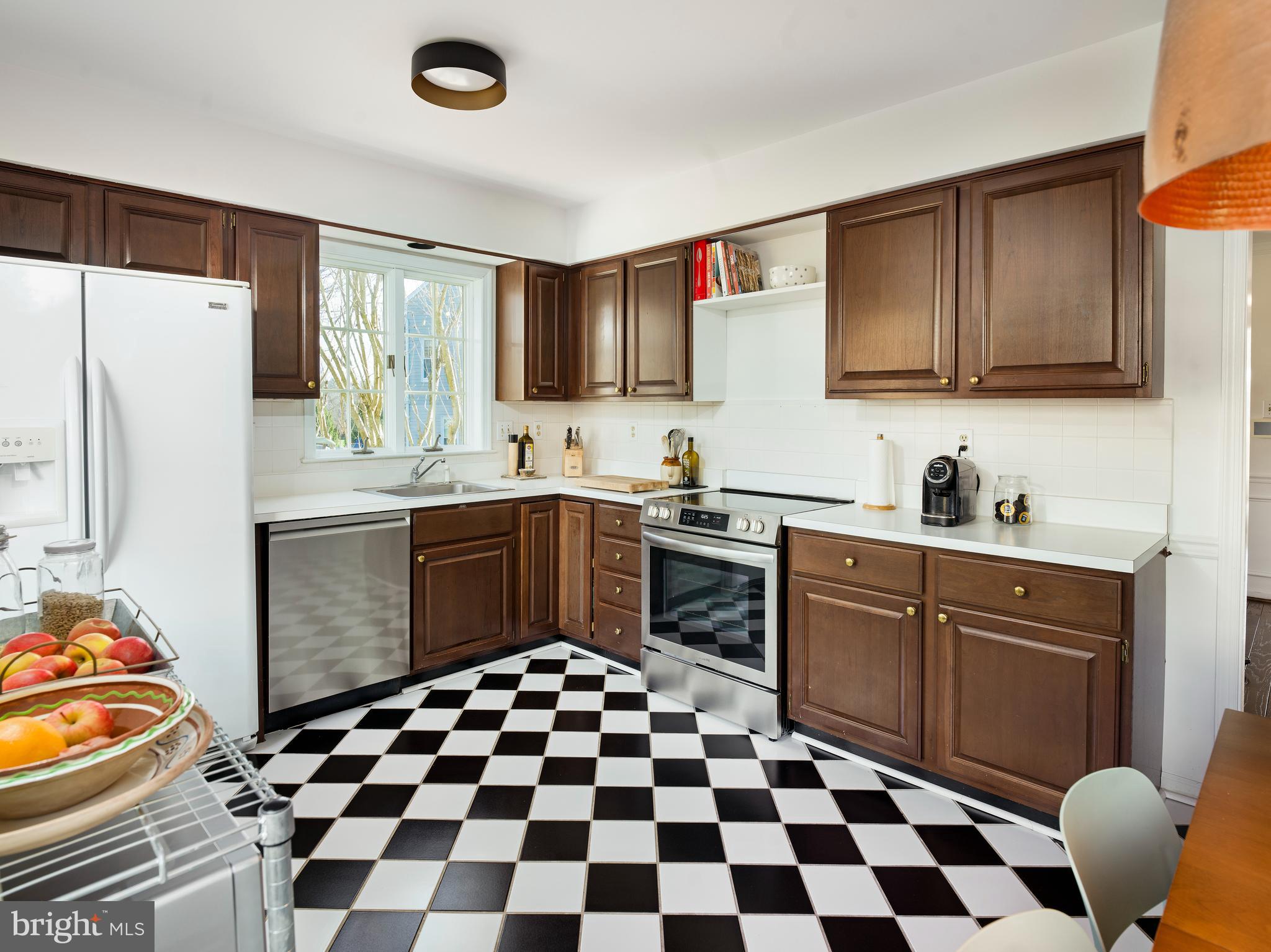 534 Pewter Drive Exton, PA 19341 - Photo 9 of 39 a kitchen with a sink a stove and a refrigerator