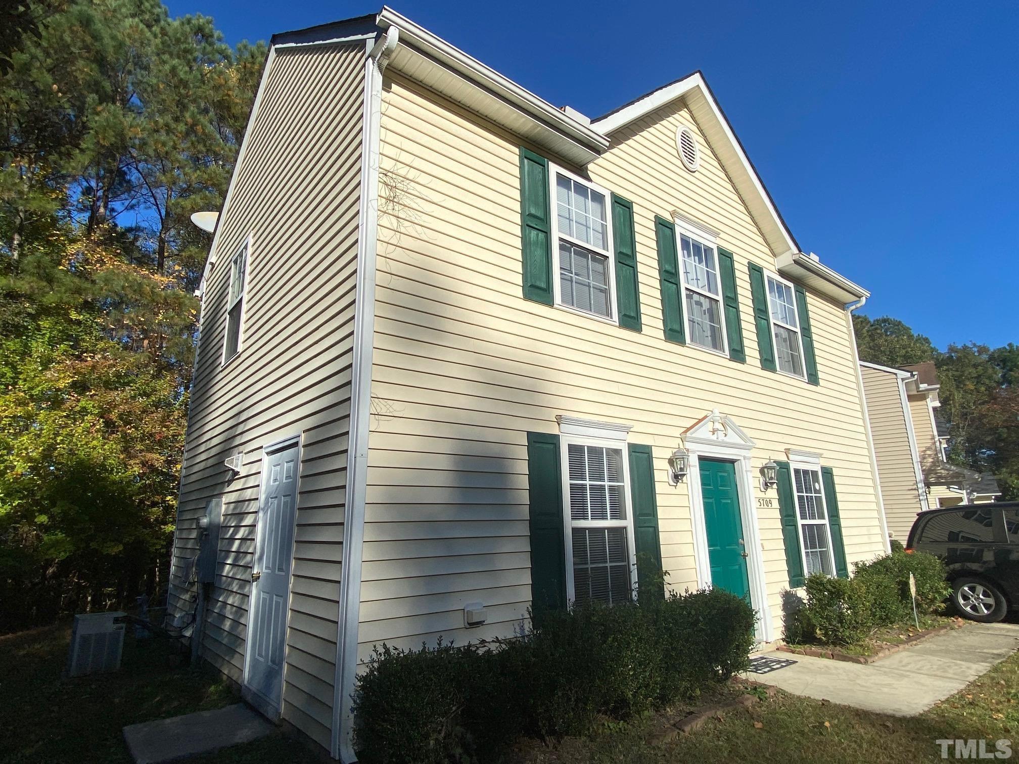 5709 Forest Point Road Raleigh, NC 27610 - Photo 2 of 19 a view of a house with a yard