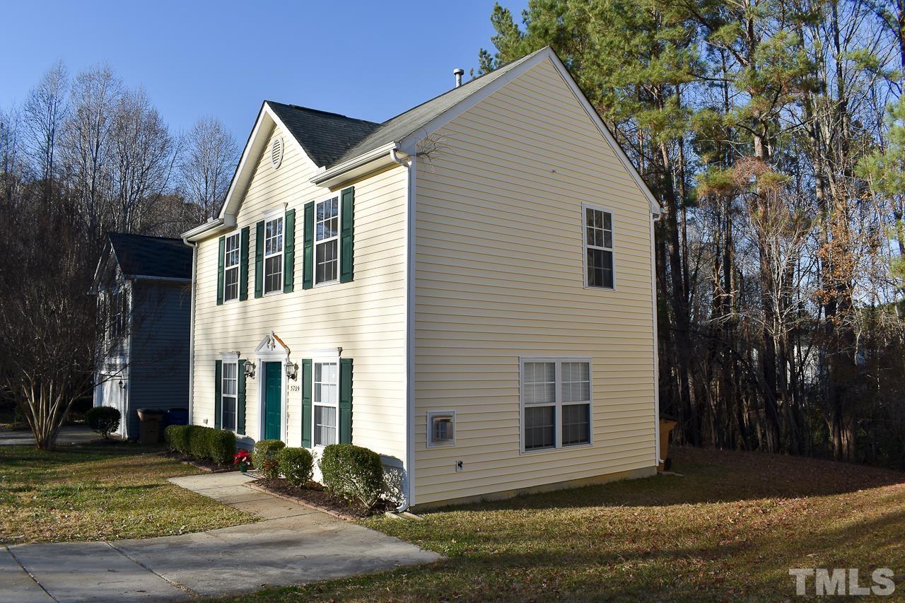 5709 Forest Point Road Raleigh, NC 27610 - Photo 18 of 19 a view of a house with a yard