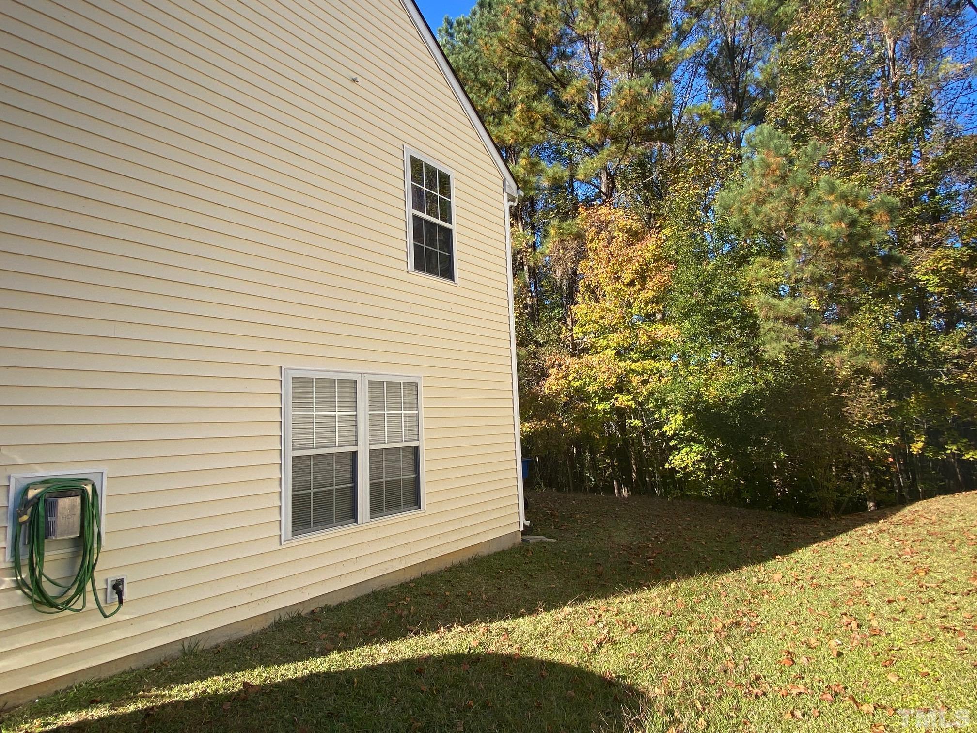 5709 Forest Point Road Raleigh, NC 27610 - Photo 3 of 19 a view of a house with a yard