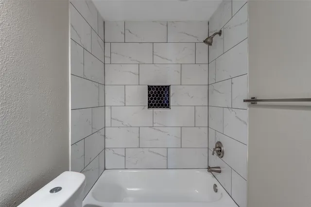 a bathroom with a bathtub