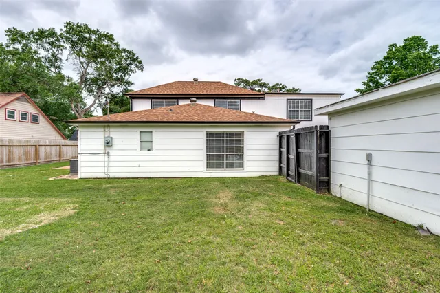 a view of a backyard of the house