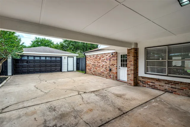 a front view of a house with a garage