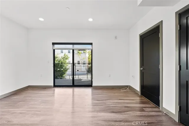 a kitchen with a refrigerator a sink and a refrigerator