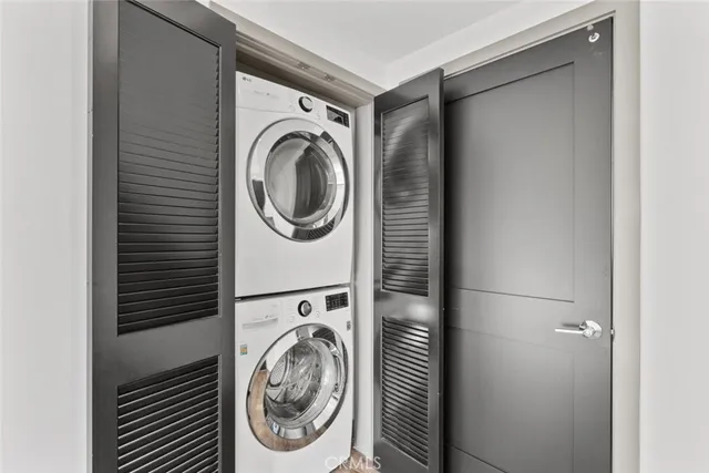 a view of a kitchen with a sink and a window