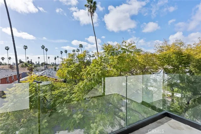 a bathroom with a sink toilet and mirror