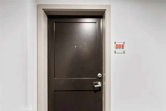 a view of a storage & utility room with washer and dryer