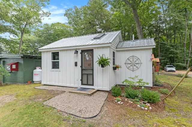 $294,900 | 8124 Deadstream Road, Unit 7, Honor, MI 49640