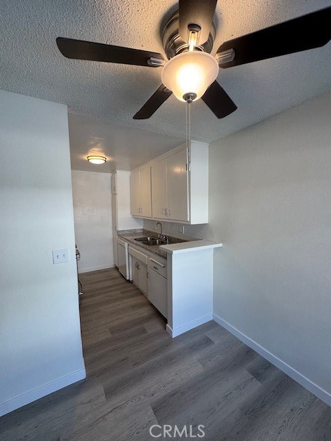 7524 Haskell Avenue, Unit 5 Van Nuys, CA 91406 - Photo 13 of 15 a view of kitchen with sink and wooden floor