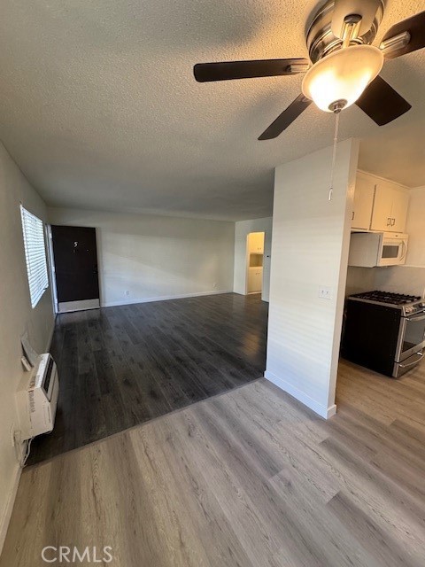 7524 Haskell Avenue, Unit 5 Van Nuys, CA 91406 - Photo 14 of 15 a view of a livingroom with wooden floor