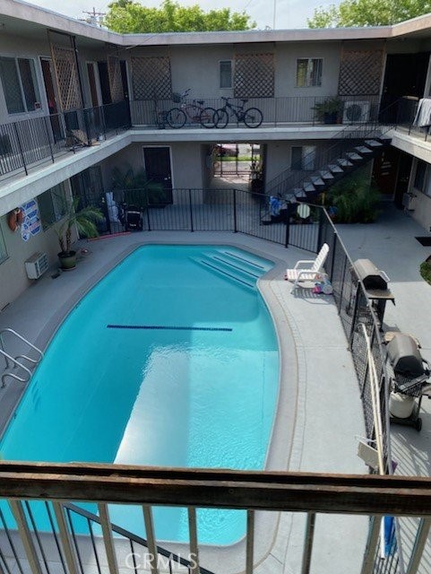 7524 Haskell Avenue, Unit 5 Van Nuys, CA 91406 - Photo 3 of 15 a view of swimming pool with outdoor seating