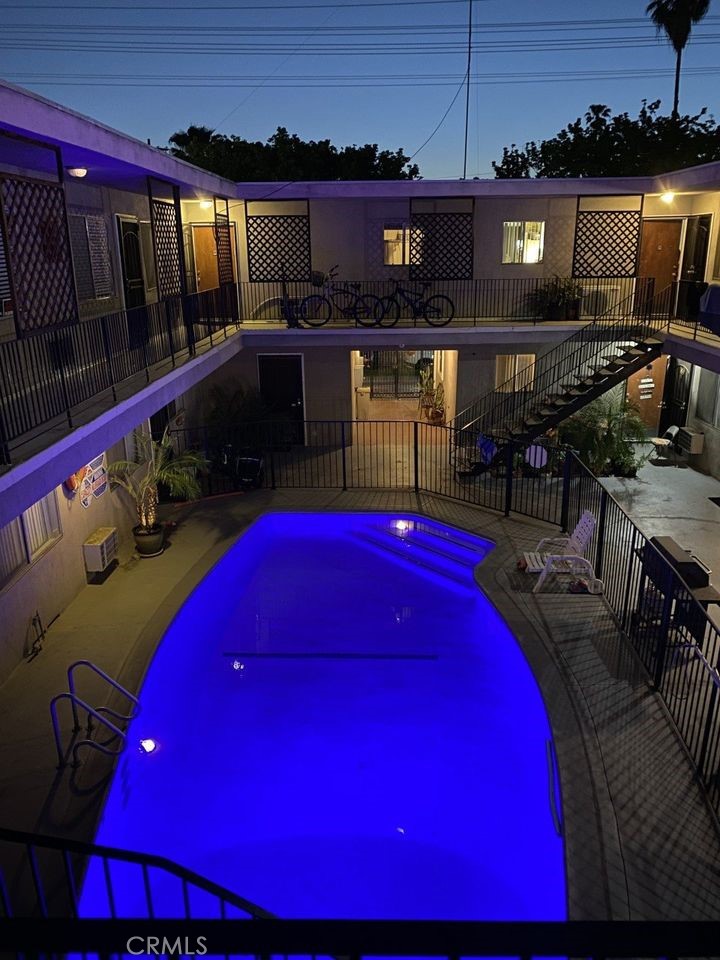 7524 Haskell Avenue, Unit 5 Van Nuys, CA 91406 - Photo 4 of 15 a view of swimming pool with outdoor seating