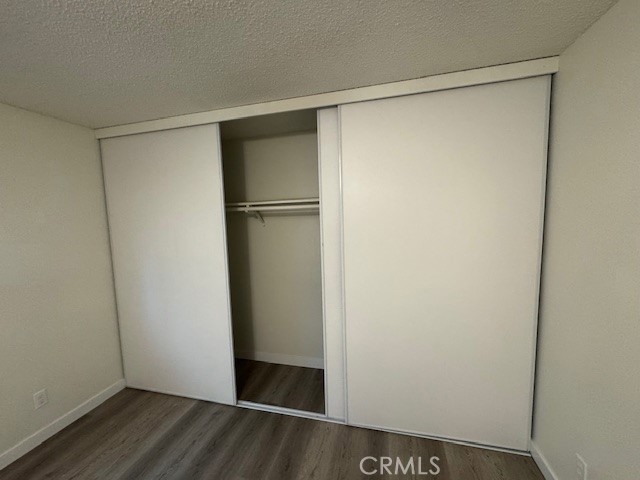 7524 Haskell Avenue, Unit 5 Van Nuys, CA 91406 - Photo 7 of 15 a view of walk in closet with wooden floor