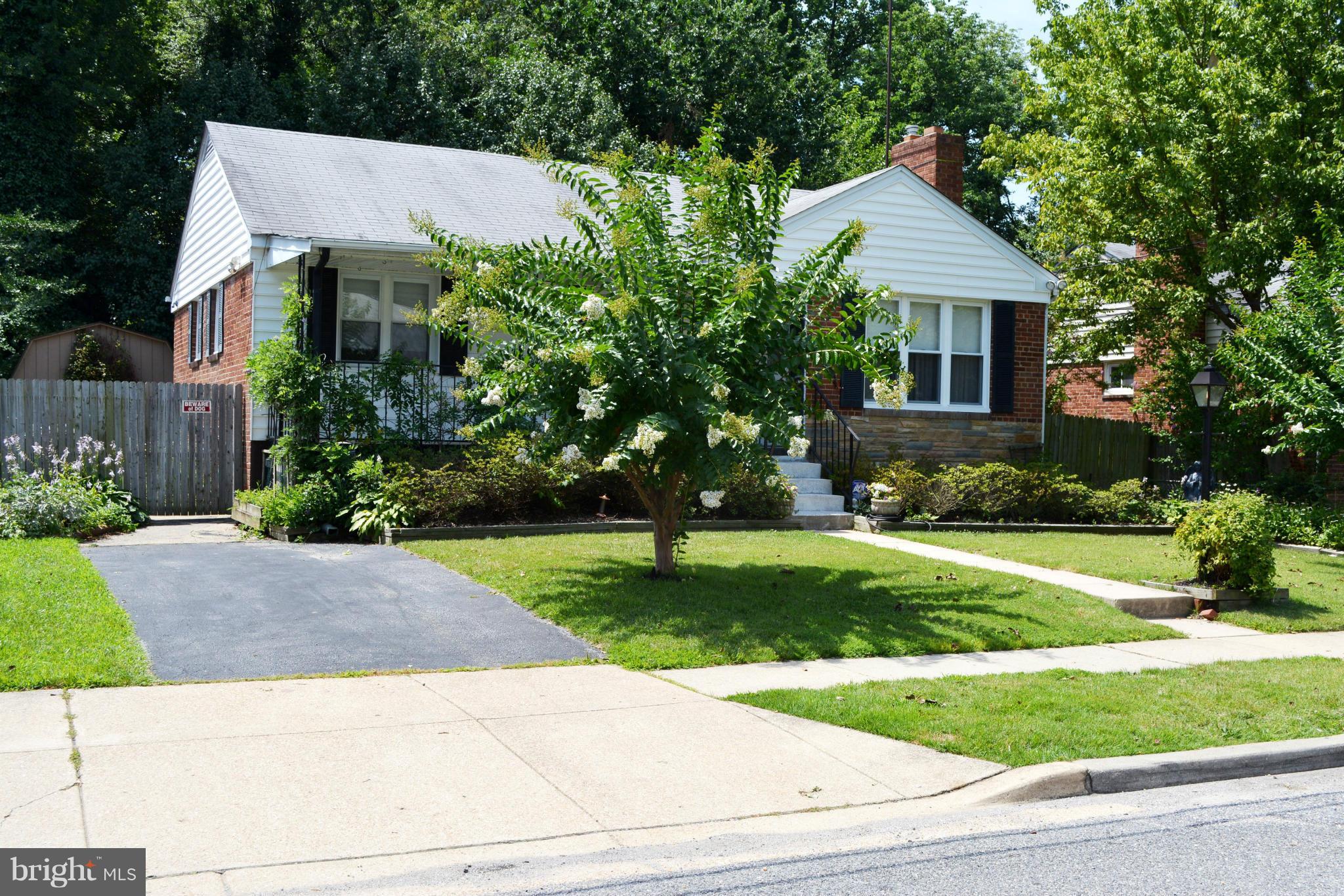 2117 Rolander Street Hyattsville, MD 20783 - Photo 3 of 30 a front view of a house with a yard