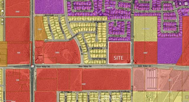 0 Bear Valley Road Victorville, CA 92392 - Photo 3 of 3 a street sign on a wall next to a building