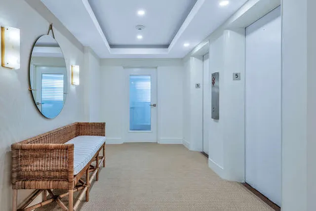 an entryway with a workspace