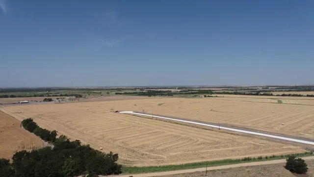 a view of a swimming pool with a balcony