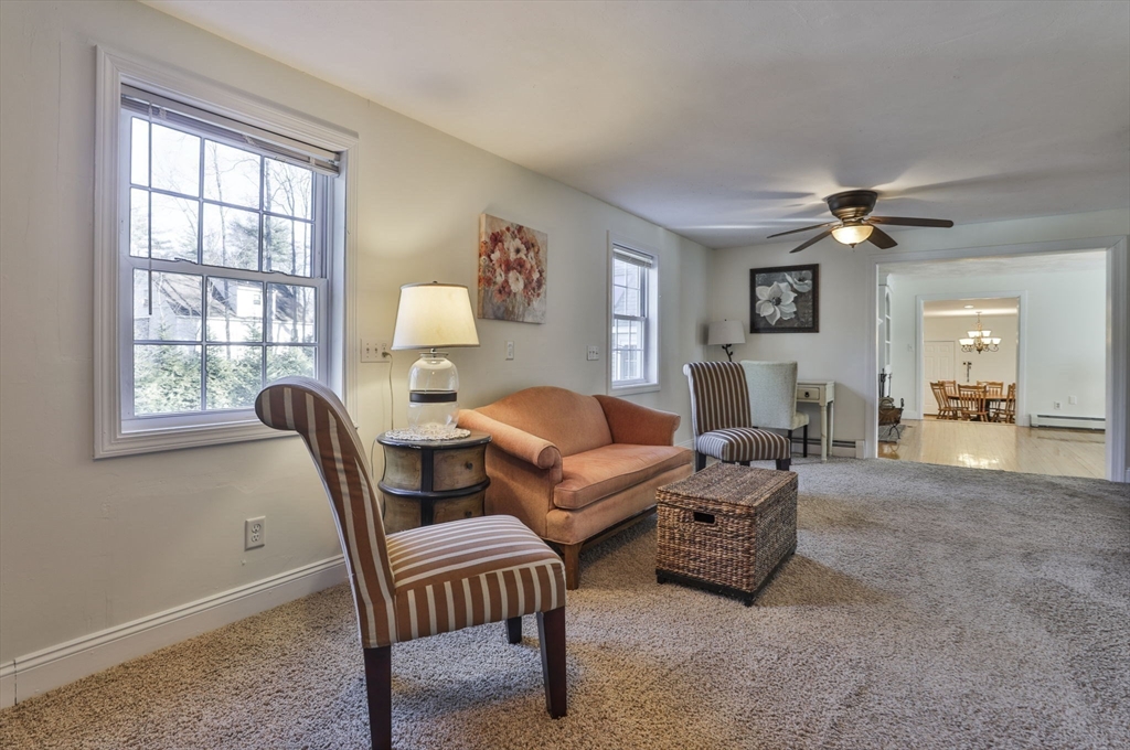 207 Oakridge Road Plaistow, NH 03865 - Photo 28 of 42 a living room with furniture and a window