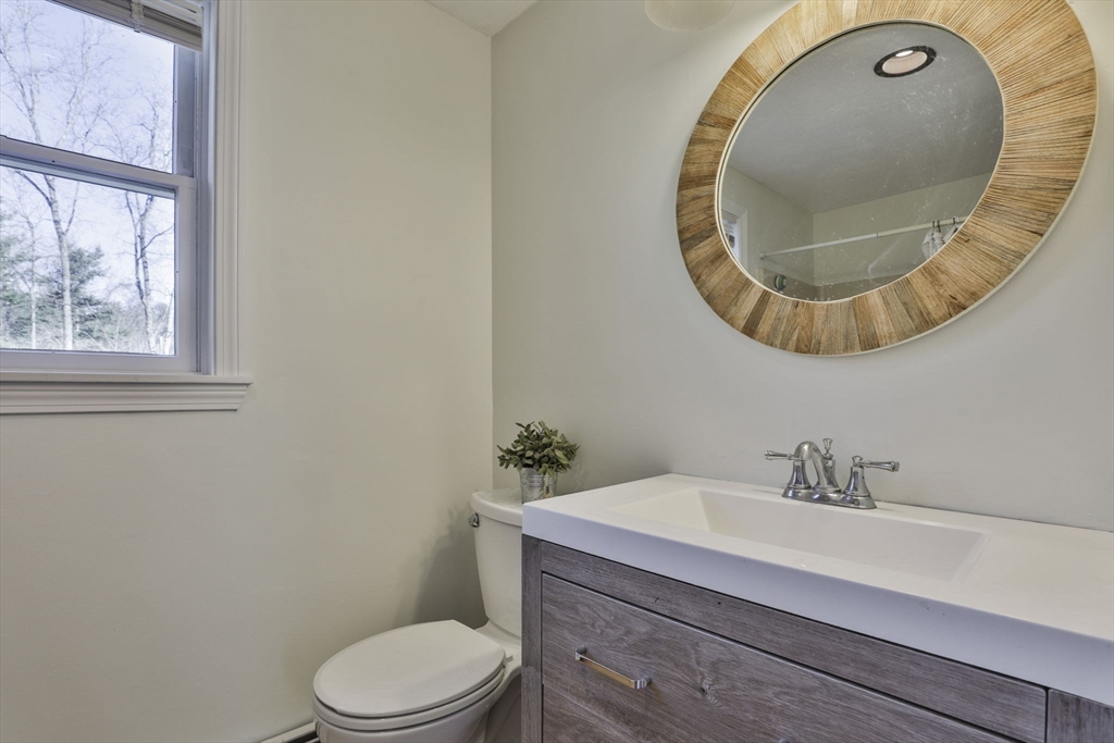 207 Oakridge Road Plaistow, NH 03865 - Photo 40 of 42 a bathroom with a toilet and a sink