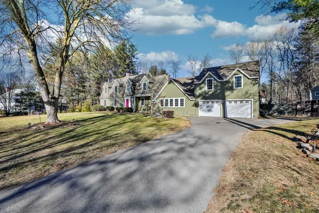 a view of a town with barn house