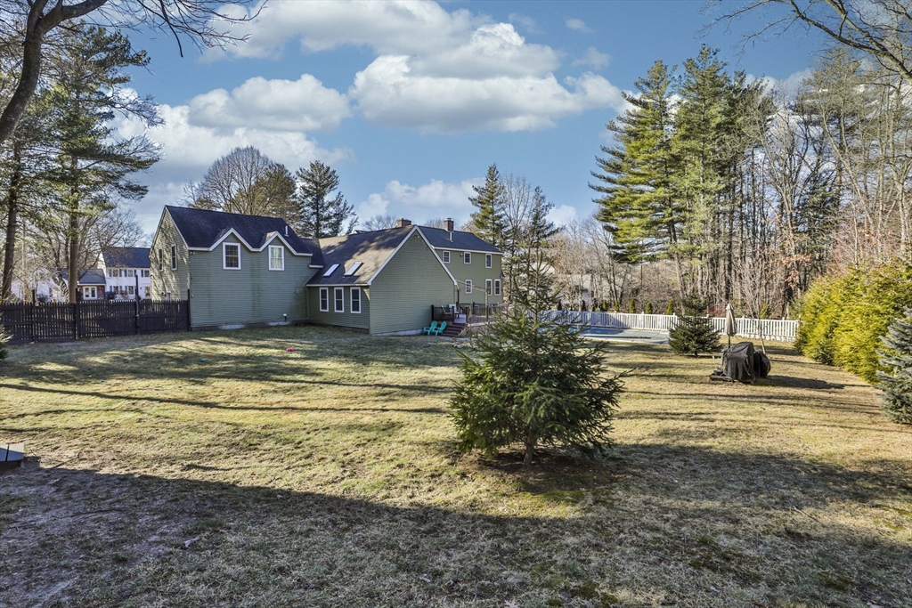 207 Oakridge Road Plaistow, NH 03865 - Photo 5 of 42 a view of a fountain in front of a house