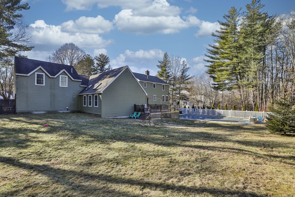207 Oakridge Road Plaistow, NH 03865 - Photo 6 of 42 a view of a house with a yard