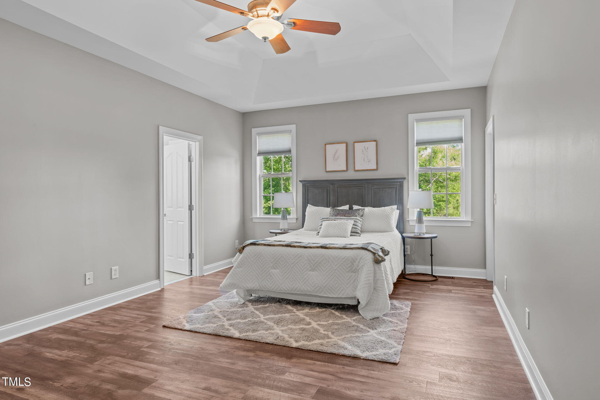 7409 Ladora Drive Willow Spring, NC 27592 - Photo 16 of 33 a bedroom with a bed and a window