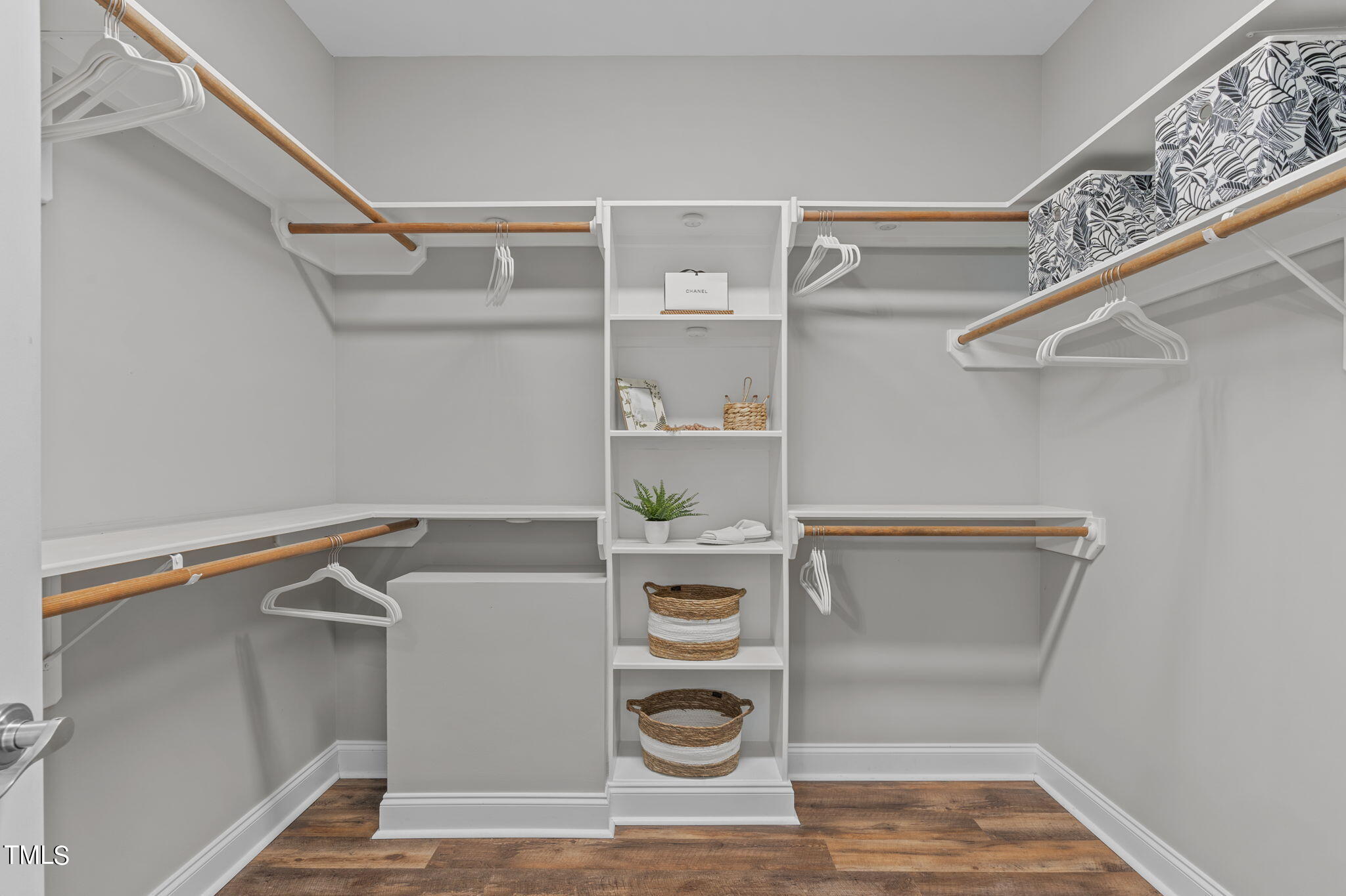 7409 Ladora Drive Willow Spring, NC 27592 - Photo 20 of 33 a view of walk in closet with empty racks