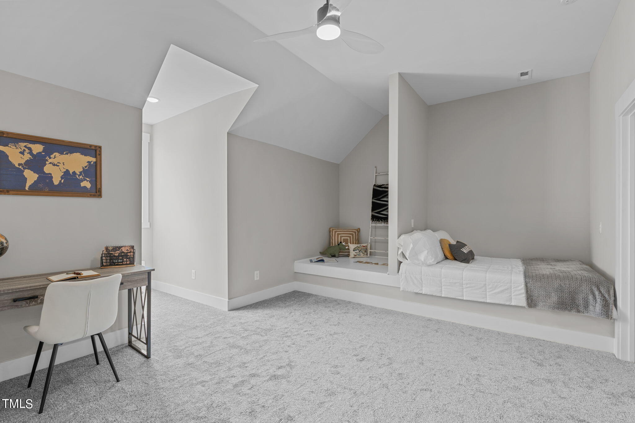 7409 Ladora Drive Willow Spring, NC 27592 - Photo 26 of 33 a bedroom with furniture and a chair