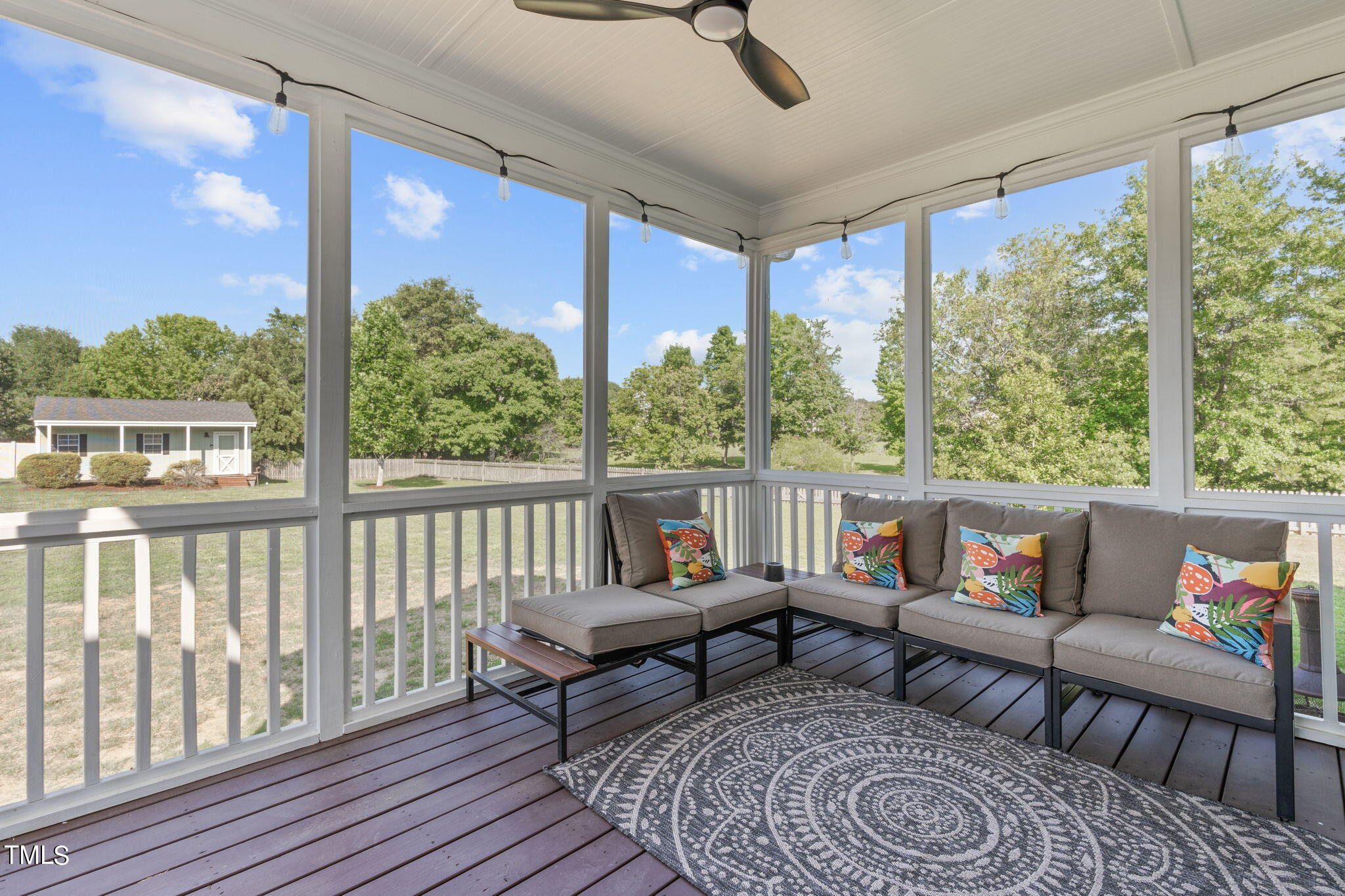7409 Ladora Drive Willow Spring, NC 27592 - Photo 29 of 33 a living room with furniture and a window