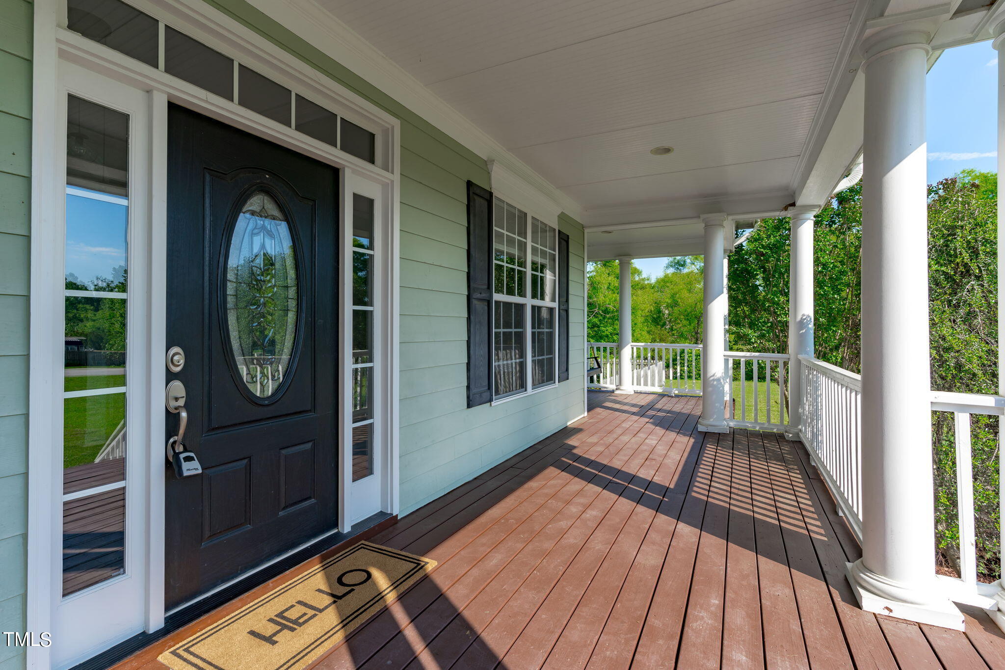 7409 Ladora Drive Willow Spring, NC 27592 - Photo 5 of 33 a view of balcony with wooden floor