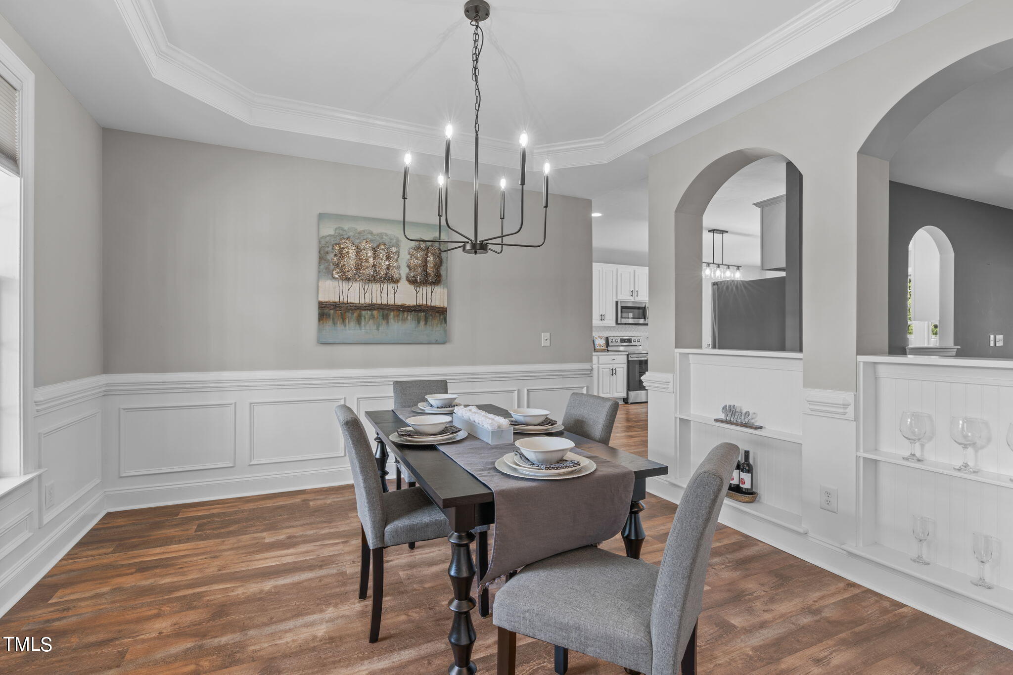 7409 Ladora Drive Willow Spring, NC 27592 - Photo 8 of 33 a view of a dining room with furniture window and wooden floor