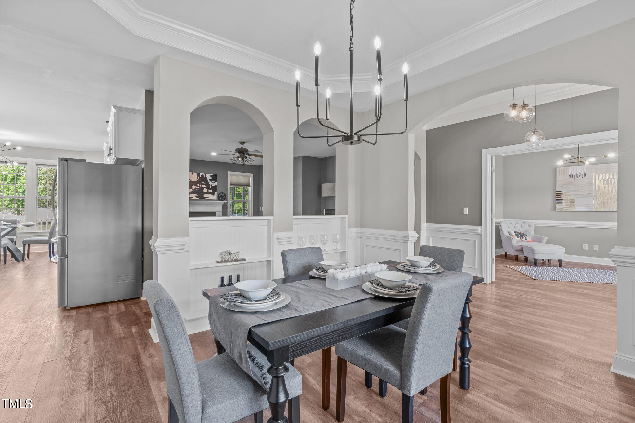 7409 Ladora Drive Willow Spring, NC 27592 - Photo 9 of 33 a view of a dining room with furniture and wooden floor