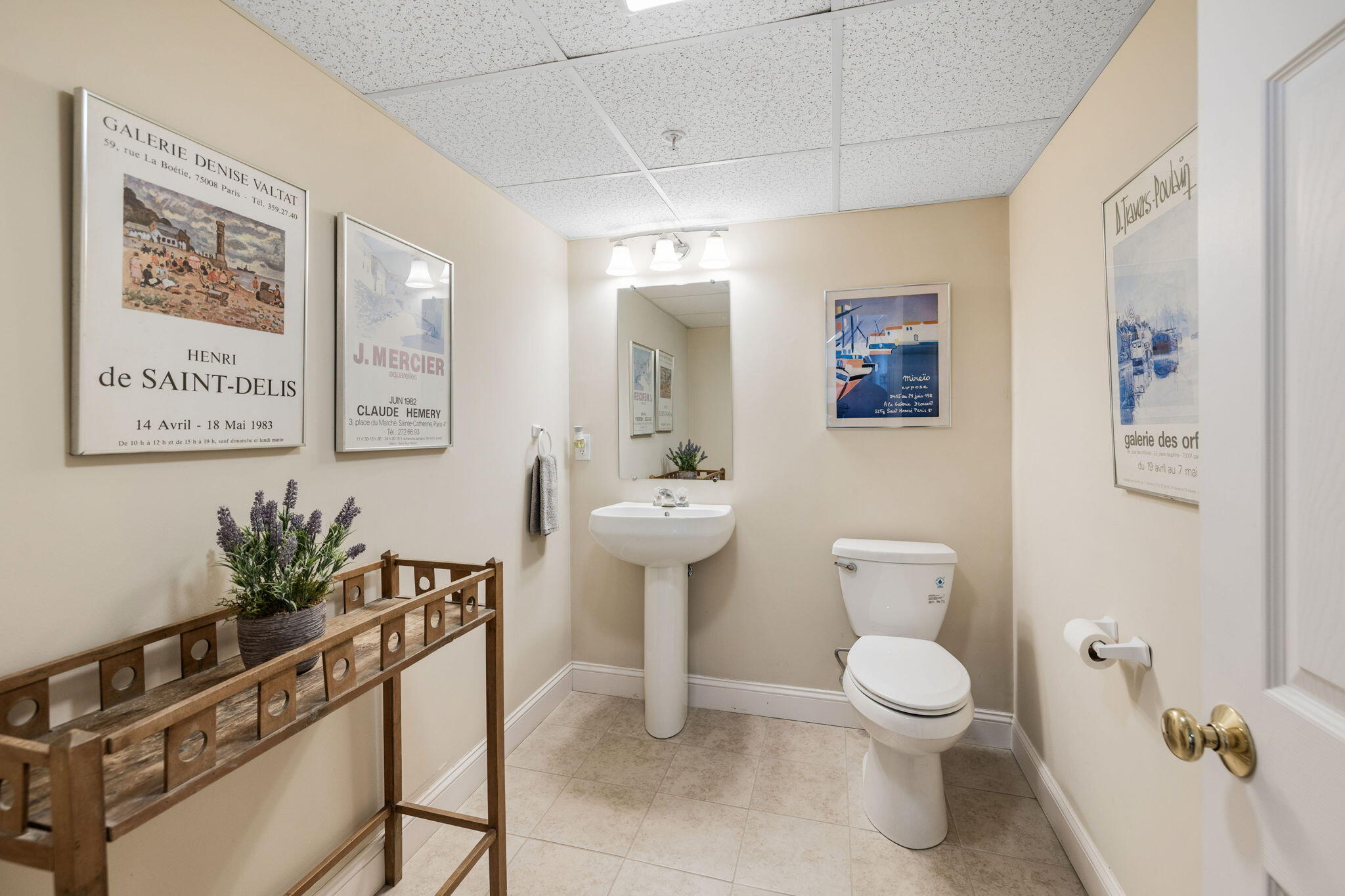16 Grey Hawk Drive, Unit 16 Mashpee, MA 02649 - Photo 24 of 29 a bathroom with a toilet sink and mirror