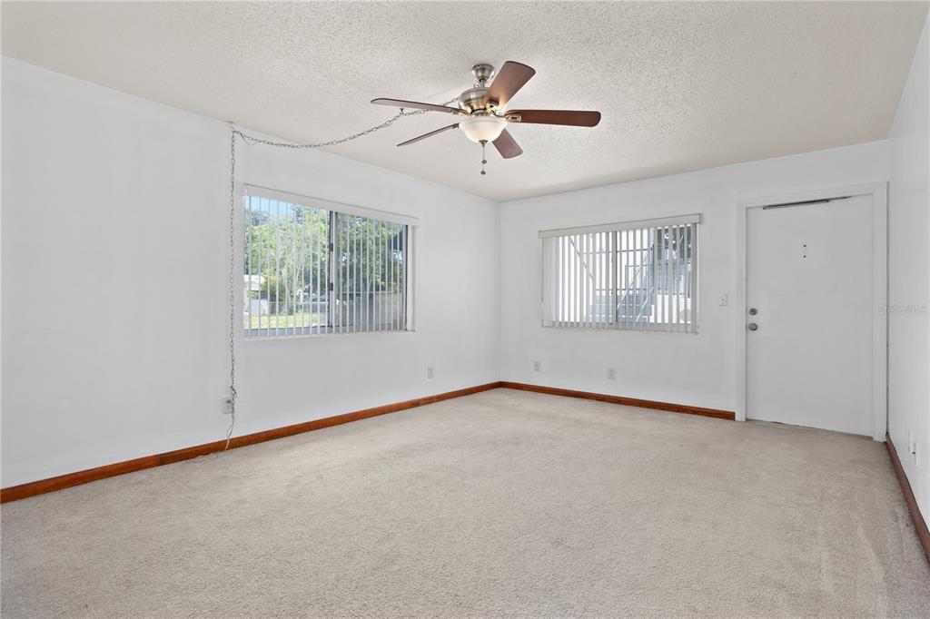 303 Ridge Boulevard, Unit 110 South Daytona, FL 32119 - Photo 16 of 33 a view of an empty room with a window