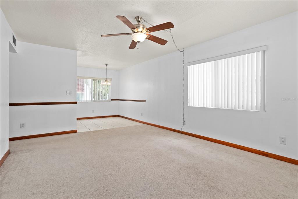 303 Ridge Boulevard, Unit 110 South Daytona, FL 32119 - Photo 20 of 33 a view of an empty room with a window