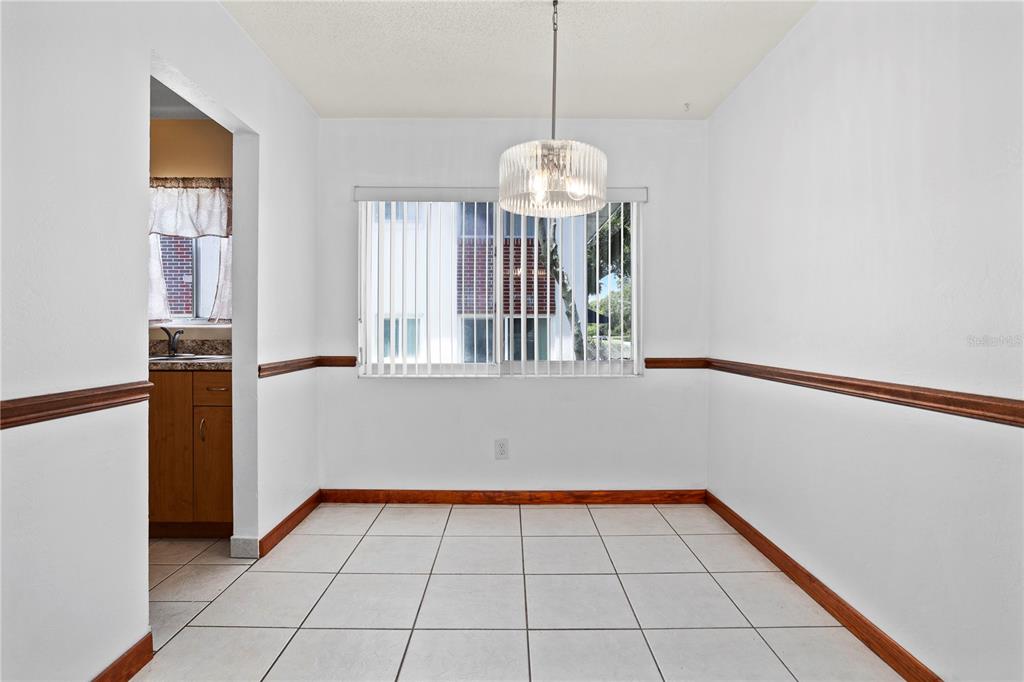 303 Ridge Boulevard, Unit 110 South Daytona, FL 32119 - Photo 21 of 33 a view of an empty room with a window