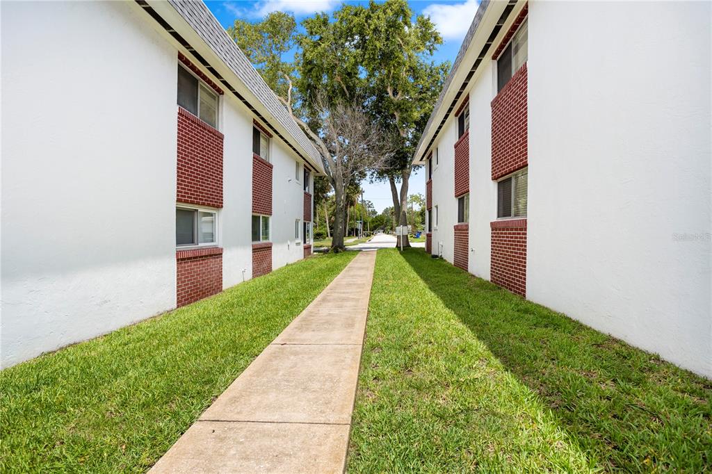 303 Ridge Boulevard, Unit 110 South Daytona, FL 32119 - Photo 27 of 33 a view of a back yard of the house