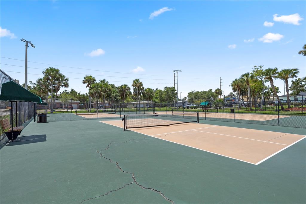 303 Ridge Boulevard, Unit 110 South Daytona, FL 32119 - Photo 31 of 33 a view of an outdoor space and tennis court