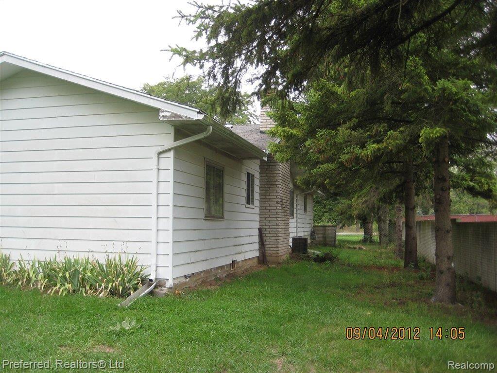 8809 Rawsonville Road Belleville, MI 48111 - Photo 3 of 24 rear