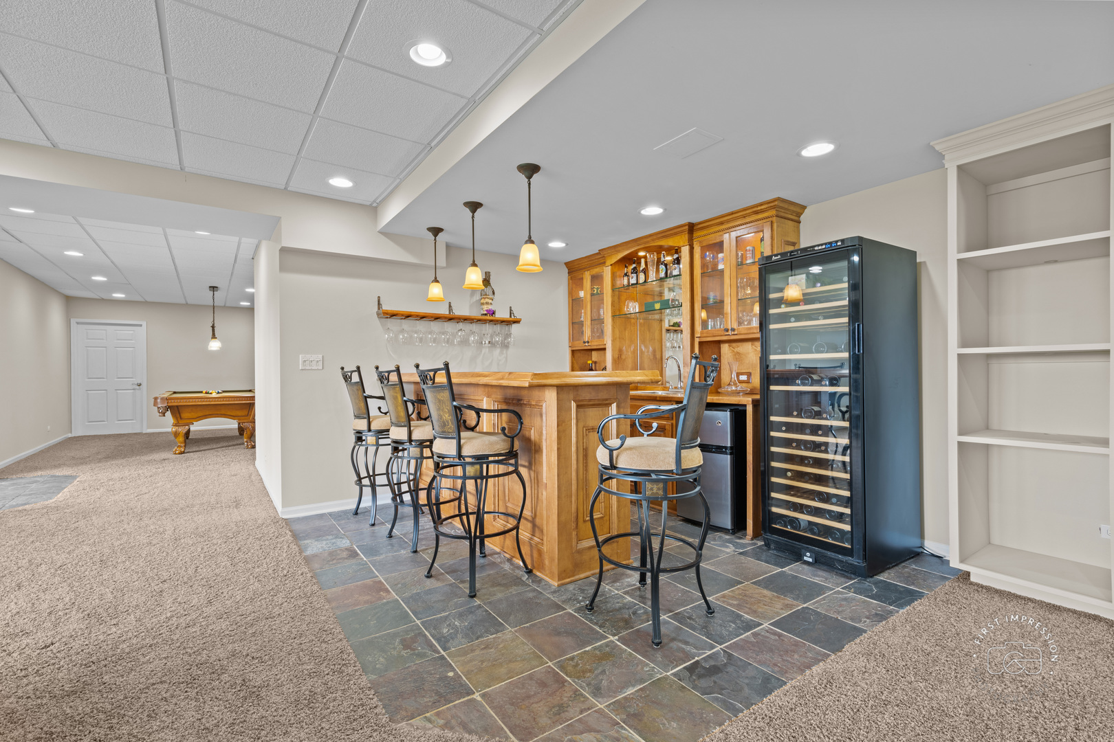 334 Willowbrook Way Geneva, IL 60134 - Photo 16 of 34 a view of a kitchen with furniture and a refrigerator