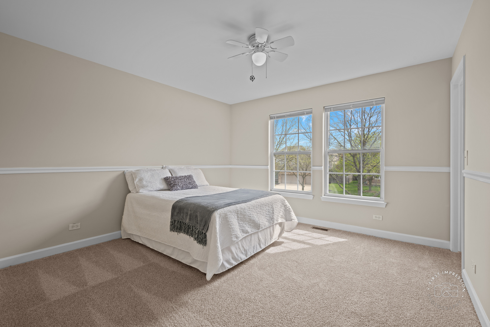 334 Willowbrook Way Geneva, IL 60134 - Photo 18 of 34 a spacious bedroom with a bed and a window