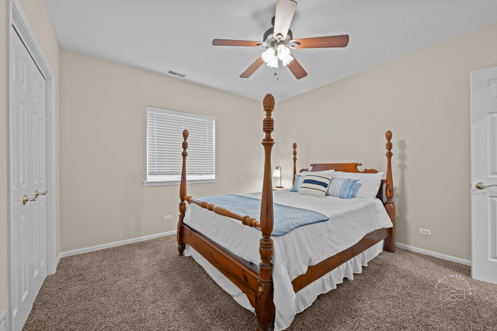 334 Willowbrook Way Geneva, IL 60134 - Photo 23 of 34 a bed room with a bed and a chandelier
