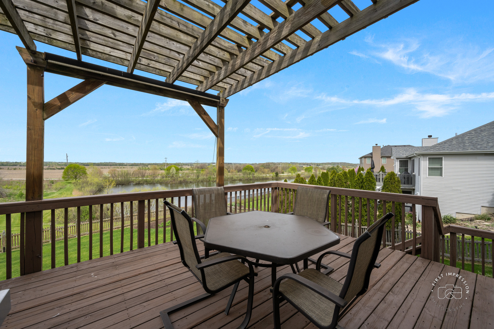 334 Willowbrook Way Geneva, IL 60134 - Photo 26 of 34 a view of a balcony and table on wooden floor