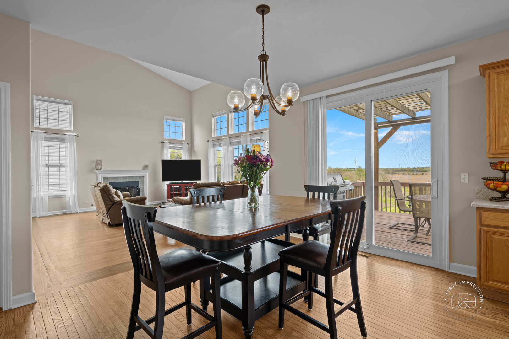334 Willowbrook Way Geneva, IL 60134 - Photo 10 of 34 a view of a dining room with furniture window and wooden floor
