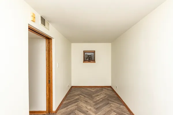 a view of a livingroom with wooden floor
