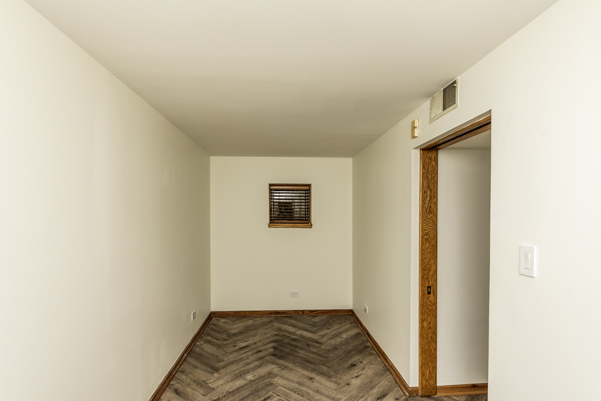 4625 North Dover Street, Unit G Chicago, IL 60640 - Photo 20 of 26 a view of a livingroom with wooden floor