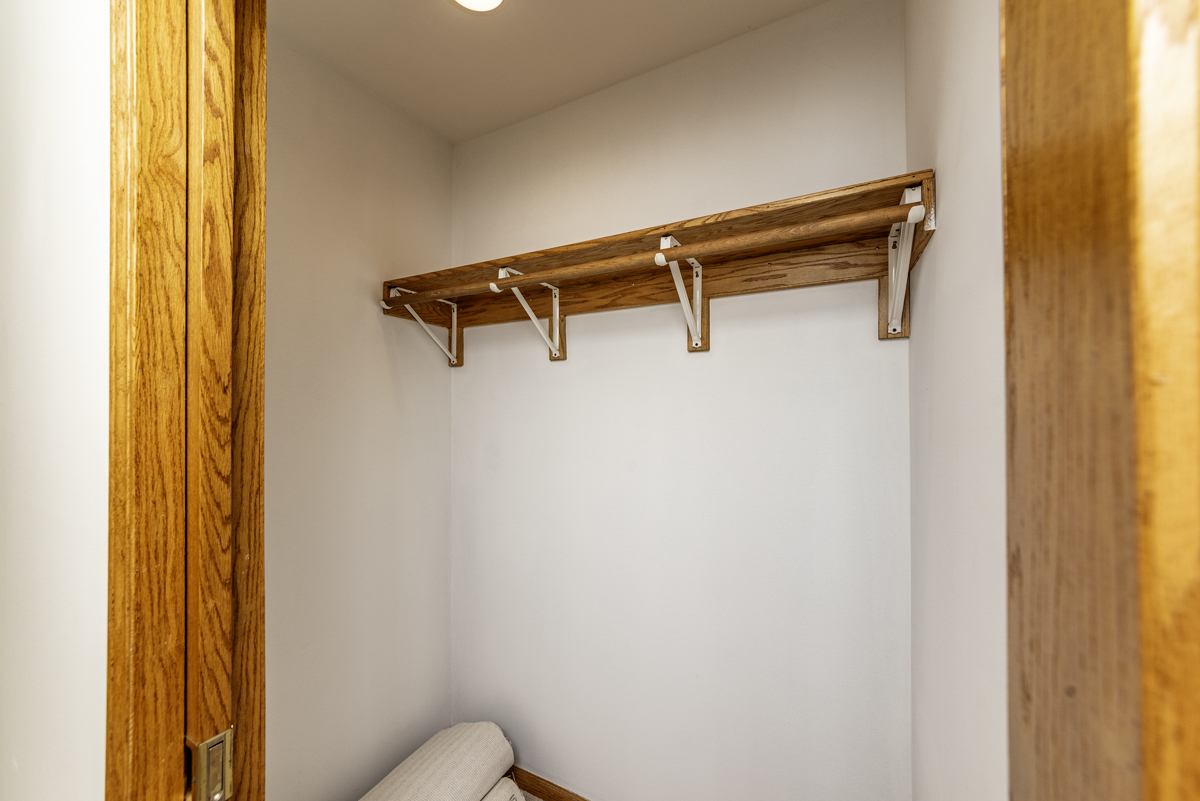4625 North Dover Street, Unit G Chicago, IL 60640 - Photo 21 of 26 a view of a room with racks on the wall